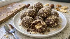Nepečené kaštanové kuličky s kakaem a ořechy: vánoční cukroví bez trouby